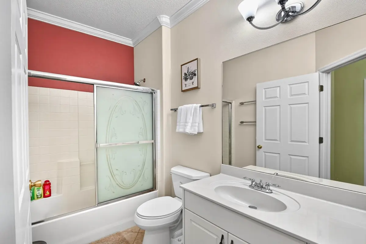 Guest bathroom with a tub and shower