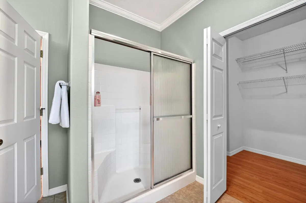 Walk-in shower and closet in the bathroom