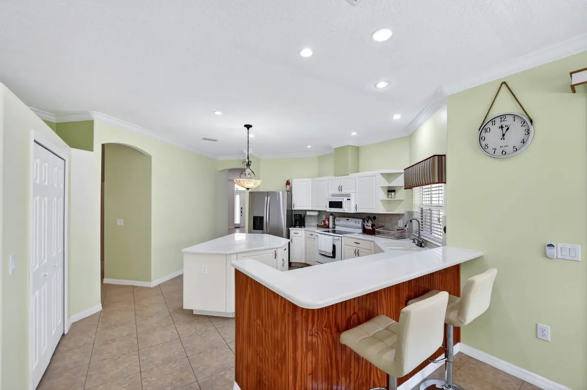 Kitchen island with bar stools