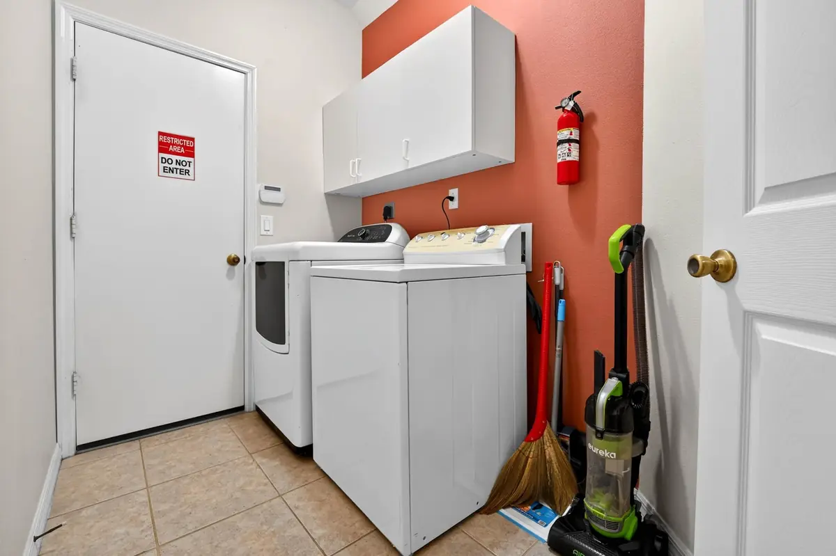 Laundry room with a washer and dryer